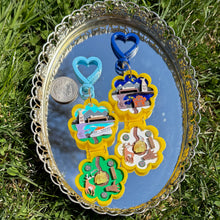 Load image into Gallery viewer, Yellowjackets Pocket World BAG CHARMS
